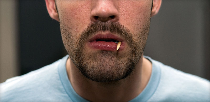 A picture of me chewing on a pseudo toothpick. It's actually half a kebab skewer. A picture of me chewing on a pseudo toothpick. It's actually half a kebab skewer.